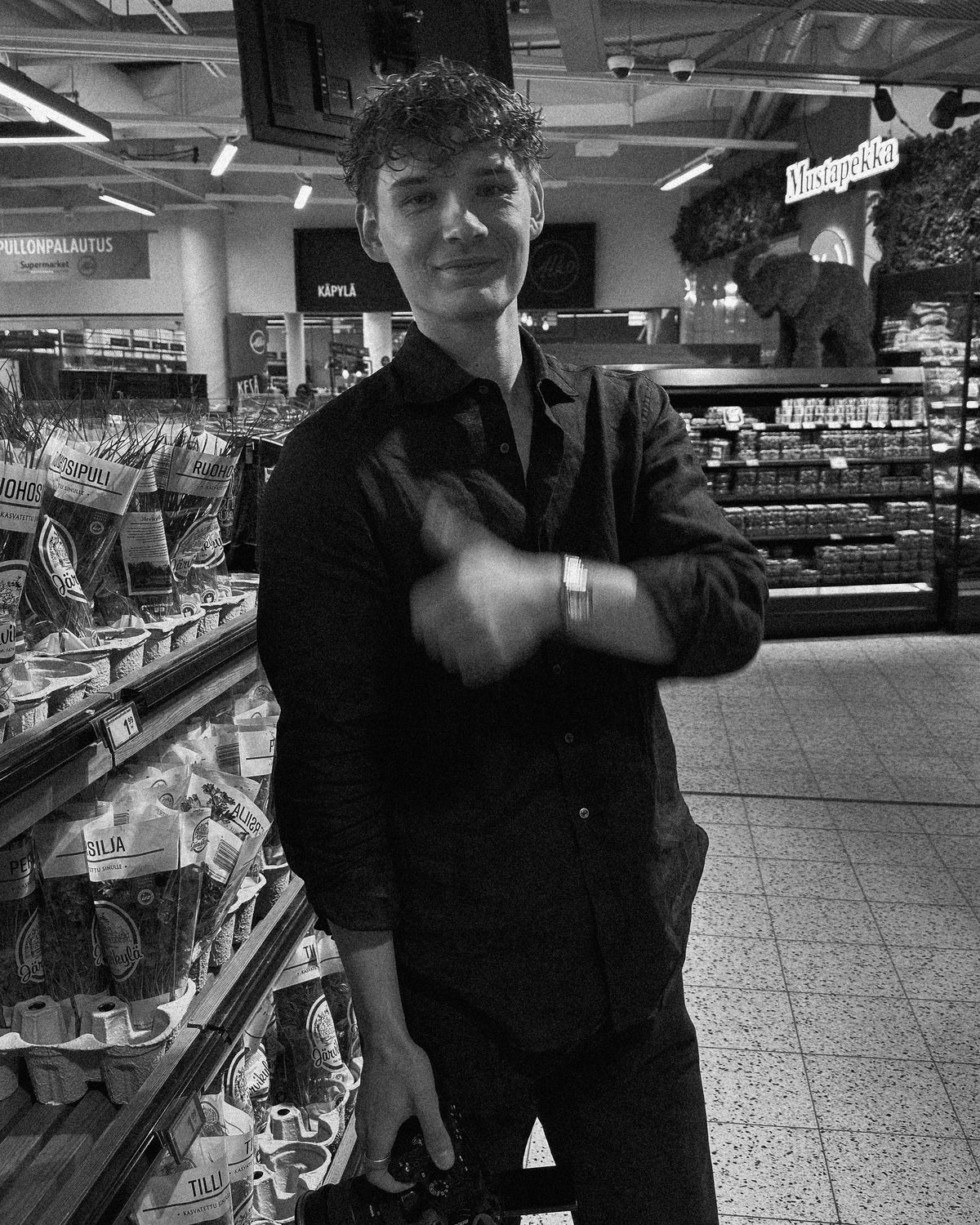 A shoot day in a supermarket aisle, black and white